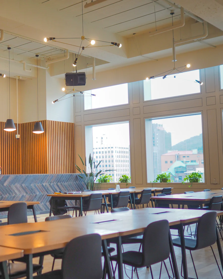 Restaurant and retail interior design with warm wood and feature lighting
