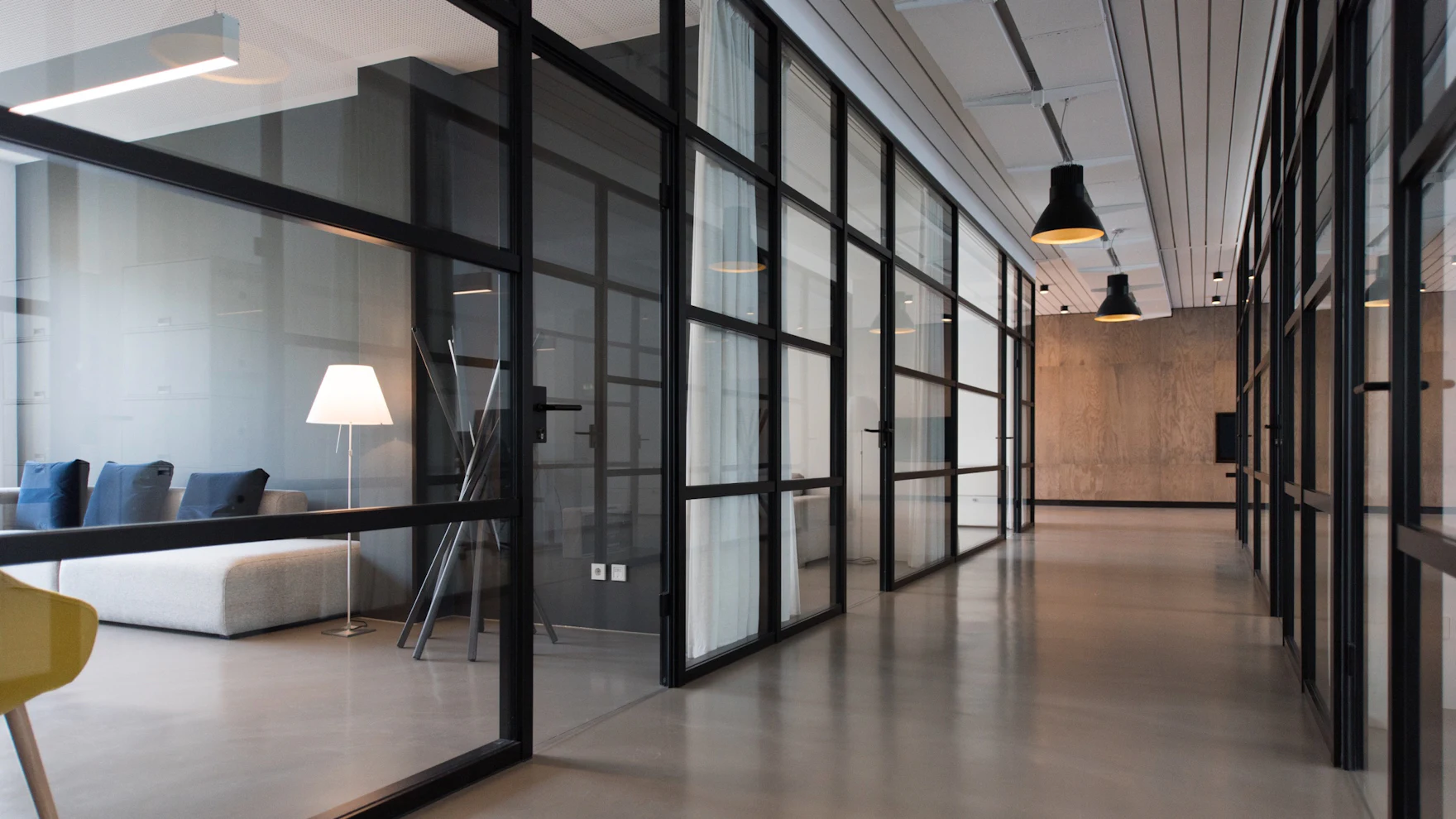 Commercial interior design — modern office with glass partitions